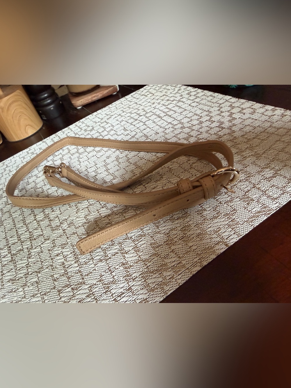 Light tan crossbody purse strap gold hardware
